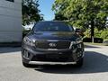 A 2017 Kia Sorento in dark gray with a distinctive front grille and sleek headlights facing forward