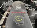 Close-up of a 2006 Dodge Ram 2500 engine featuring a Cummins 24V Turbo Diesel valve cover and a diesel engine oil cap