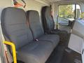 Interior view of a 2022 Lion Lion6 with three fabric seats in the front cabin area showcasing a modern and spacious layout