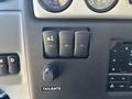 Dashboard controls of a 2022 Lion Lion6 featuring three switches and a button labeled Tailgate