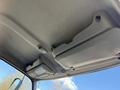 Interior view of a Hino 195 truck cabin ceiling showing storage compartments and overhead controls