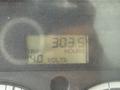 Display screen showing 303.5 hours and 40 volts on a control panel of a 2006 Sterling L7500 vehicle