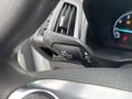 Close-up of a control stalk in a 2019 Ford Transit Connect for turn signals and headlights