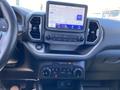 2023 Ford Bronco Sport dashboard featuring a touchscreen display and control knobs for audio and climate settings