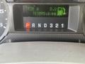 Dashboard display of a 2009 Ford F-550 showing trip A data and total distance of 183075.3 km with gear selection indicator P R N D 3 2 1
