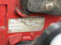 A metal identification plate from a 2021 Freightliner M2 106 showing part number serial number and ECM code