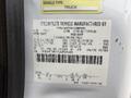 A 2018 Ford F-750 vehicle identification label displaying specifications such as weight capacity and tire details