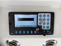 Control panel of a 2018 Grande West Vicinity featuring a touchscreen display with various buttons and a USB port