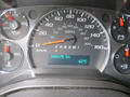 A dashboard of a 2011 Chevrolet Express showing a speedometer with a needle pointing to 0 mph and a digital display indicating 340475 km and a temperature of 42 C