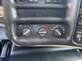 Control panel with dials for temperature and fan speed on a 2005 GMC C7500 Topkick