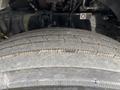 Close-up of a tire from a 2025 Peterbilt 536 showcasing detailed tread pattern and wear