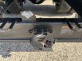 A close-up of the towing hitch on a 2019 Freightliner M2 106 showing a black metallic hook and mounting points for attachments