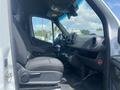 Interior view of a 2025 Mercedes-Benz Sprinter showing the driver's seat dashboard and steering wheel