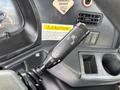 A control lever for a 2012 Autocar Xpert with settings for off and on options labeled for various functions