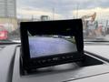 A 2017 Ford F-350 SD's dashboard display showing a rearview camera feed with a clear view of the surroundings