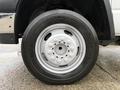 A close-up of a Goodyear tire mounted on a 2008 Sterling Bullet with a silver rim and visible lug nuts