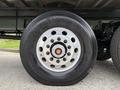 Close-up of a 2019 Ford F-750 wheel featuring a shiny chrome rim and a Continental tire with a distinct tread pattern