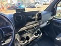Dashboard of a 2021 Mercedes-Benz Sprinter 2500 featuring a central infotainment system air vents and multiple cup holders