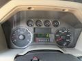 Dashboard of a 2008 Ford F-550 with gauges for RPM speed fuel temperature and an odometer displaying the mileage