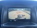 Rearview camera display showing a 2017 Chevrolet Colorado with guidance lines for parking assistance