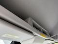 Interior view of a 2017 Ford Transit showing the overhead storage compartment and the vehicle's roof lining