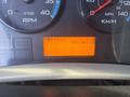 Dashboard of a 2008 International 4400 showing RPM gauge, speedometer, and a digital display indicating gear position RND4321 and PTO hours at 0.0