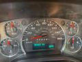 Dashboard of a 2018 Chevrolet Express showing speedometer fuel gauge and temperature display