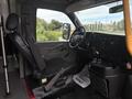 Interior view of a 2020 Chevrolet Express showing the driver's seat steering wheel and dashboard with controls and gauges