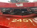 Close-up of a red 2017 Ferris Rotary mower showing its pulleys and the number 2451