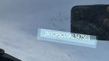 A close-up of the VIN label on a Nissan Kicks showing the alphanumeric code 3N1CP5CU9KL547569