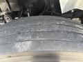 Close-up of a worn tire tread on a 2012 International 7300 Workstar showing visible grooves and signs of use