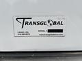 A label on a vehicle featuring the word "Transglobal" and a serial number along with a location and phone number