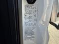 2017 Ford F-650 Super Duty with a vehicle specification label detailing manufacturing information and tire pressure requirements