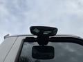 A side mirror of a 2025 Peterbilt 536 truck mounted on the exterior above the door