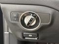 Control panel with a circular switch and buttons for headlights and fog lights in a 2016 Mercedes-Benz GLA-250 interior