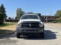 A 2016 RAM 5500 truck with a gray exterior featuring a prominent front grille and bumper positioned directly facing the viewer