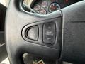 Steering wheel controls of a 2016 International 7600 including buttons for air horn and cruise throttle settings