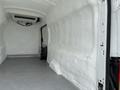 A 2017 Ford Transit van interior featuring an insulated cargo space with a flat floor and smooth white walls