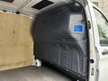 Interior view of a 2020 Mercedes-Benz Metris cargo van showing the side wall with protective paneling and a blue labeled area