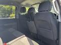 Interior view of the back seat area of a 2021 Ford F-150 featuring two headrests and a black fabric upholstery