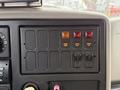 Dashboard of a 2013 International Durastar 4300 featuring control switches and indicator lights