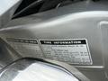 A 2016 Yamaha FJR1300AE motorcycle with a visible tire information label detailing recommended tire pressures for front and rear tires
