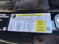 Tire and loading information label from a 2023 Fisker Ocean detailing tire dimensions and pressures for front and rear tires