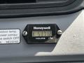 Digital hour meter displaying 537.1 hours mounted on a dashboard or panel