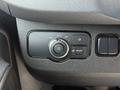 a control panel with various buttons and a rotary switch for lights in a 2023 Mercedes-Benz Sprinter