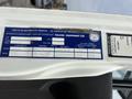 A 2012 International 7300 Workstar vehicle label showing specifications such as model, weight limits, and manufacturer details