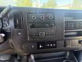 Interior dashboard of a 2017 Chevrolet Express featuring controls for air conditioning audio system and various buttons for vehicle settings