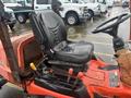 A 2010 Kubota F3680 tractor featuring a black seat and control levers positioned in front of the steering wheel