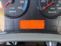 Dashboard of a 2013 International 7500 showing RPM speedometer mileage gauges and an hour meter displaying 7773 hours