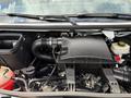 The engine compartment of a 2022 Mercedes-Benz Sprinter showcasing the air intake system and various engine components